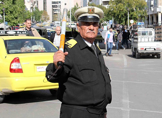 اقدم شرطي مرور في العالم في مدينة عربية Image