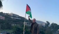 إعادة رفع العلم الفلسطيني على مدرسة وإزالة علم الاحتلال